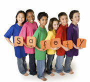 Children Holding Letters that spell safety